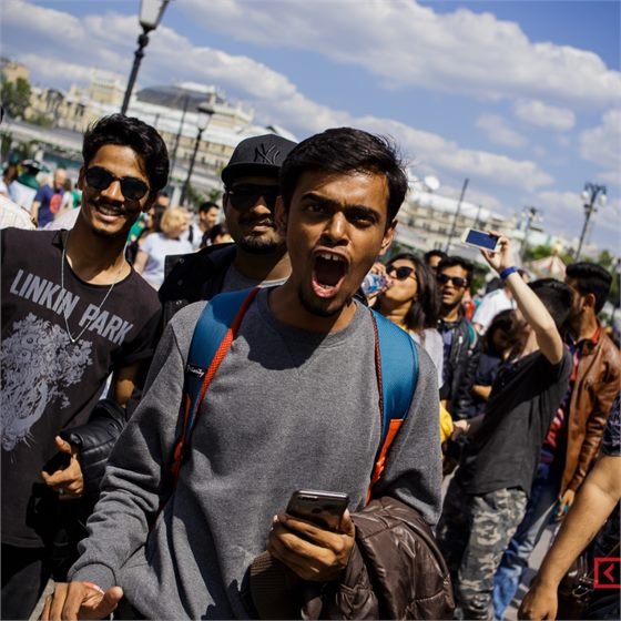 Sumeet with friends in a city square in Russia